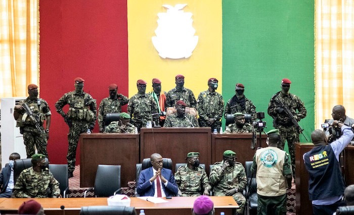 Guinea's military junta dissolves government, seals borders ags news