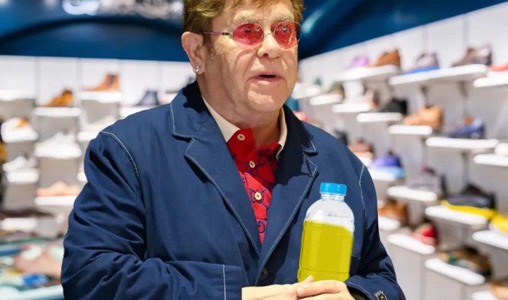 French store owner accuses singer Elton John of peeing in a plastic bottle in his store