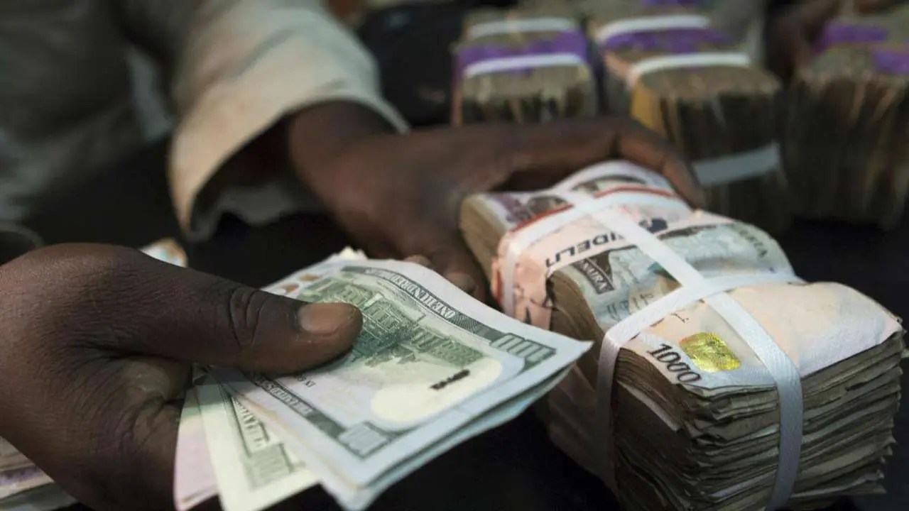 Naira drops against dollar amid fresh fuel price hike